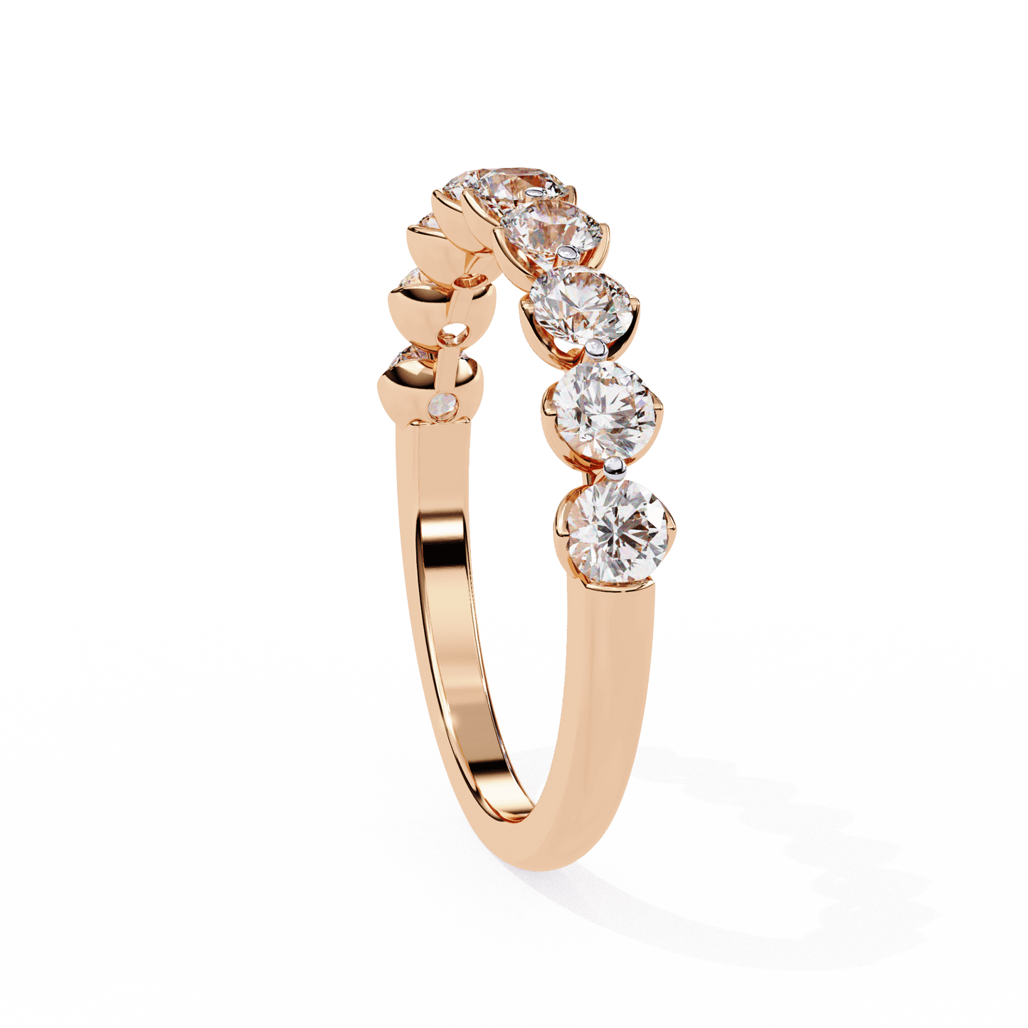 Simone shared prong diamond band with petal accents, elegant gold wedding ring by Carat House Dubai, close-up view of detailed design.
