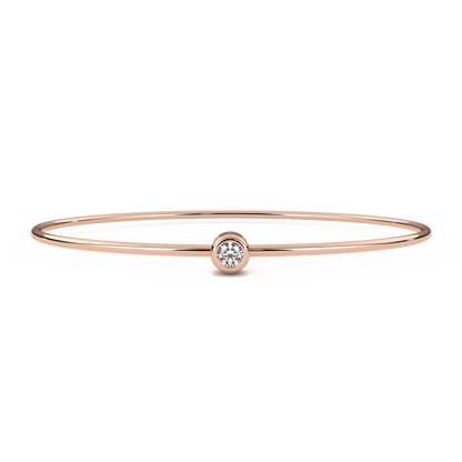 Roxana – Oval Gold Bangle with Bezel-Set Round Diamond