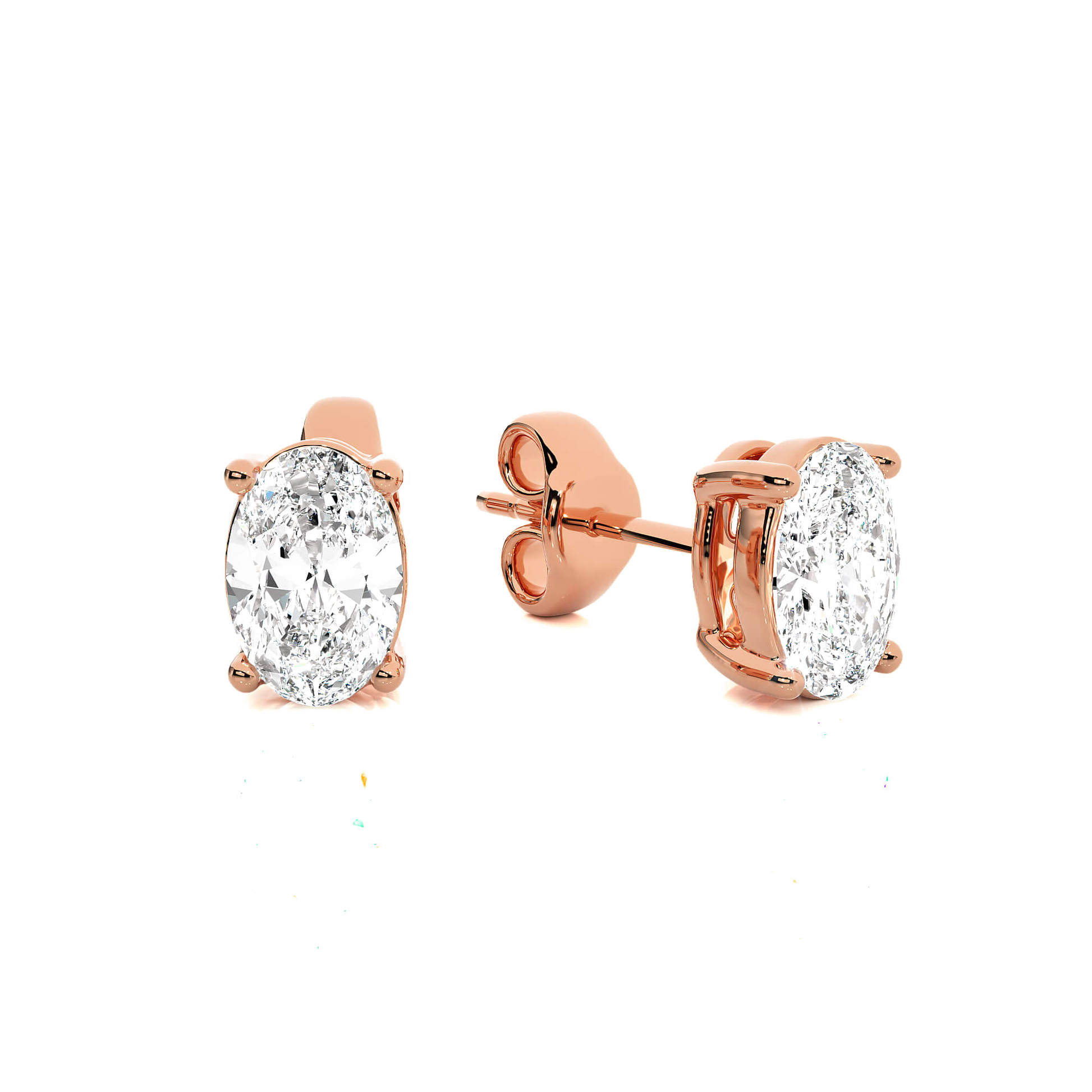 Oval-cut diamond studs in a 4-prong basket setting, showcasing Carat House Dubai jewelry with sparkling diamonds and elegant design.