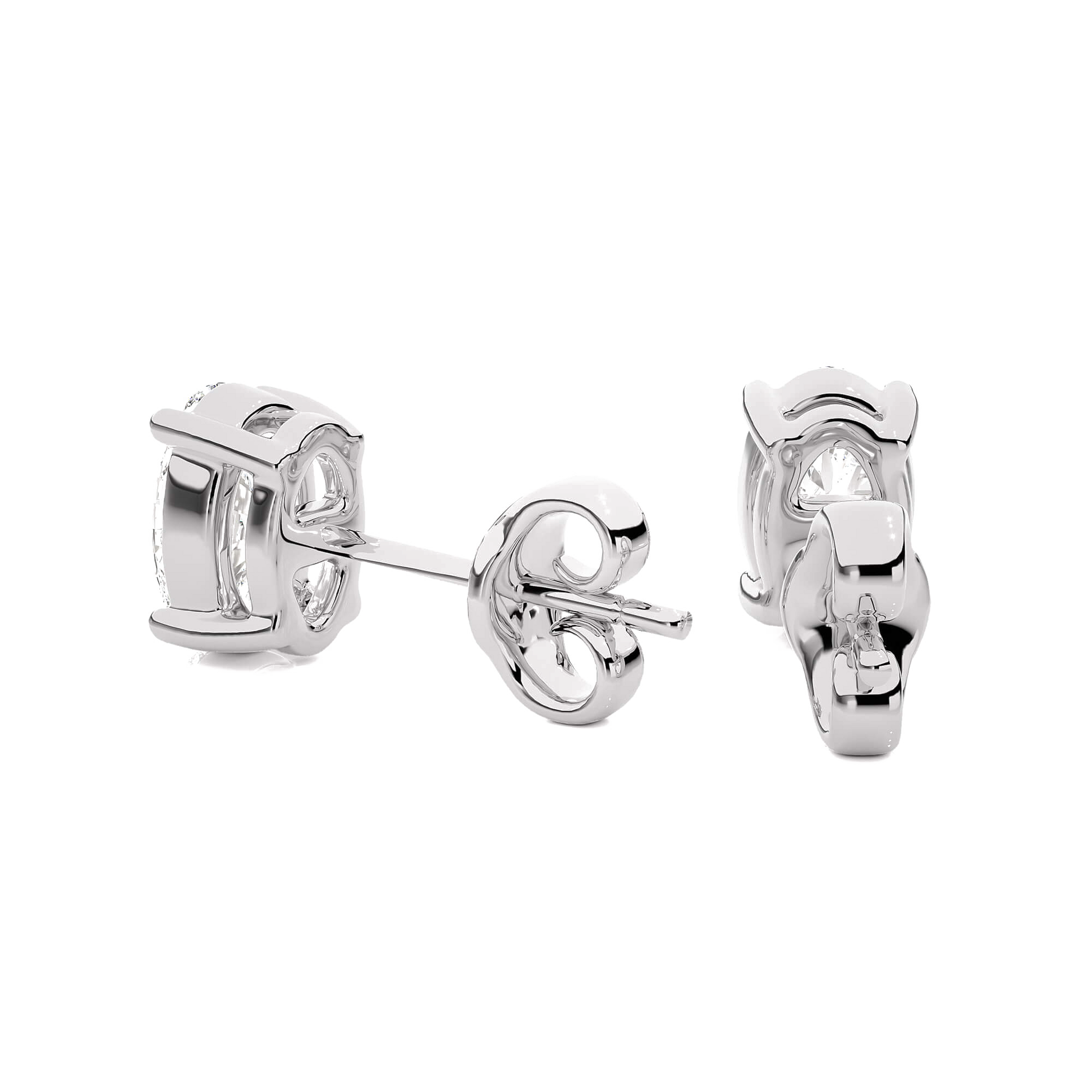 Oval-cut diamond stud earrings in a 4-prong basket setting by Carat House Dubai, showcasing sparkling diamond jewelry.