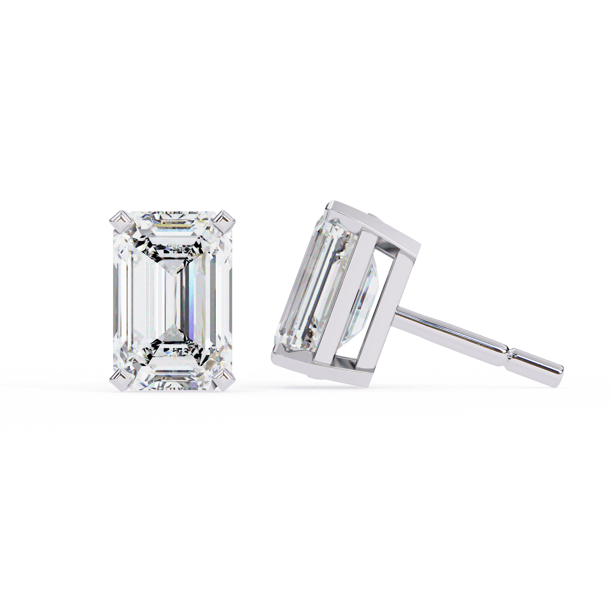 Elegant emerald stud earrings by Carat House Dubai, featuring classic, sparkling green gemstone jewelry.