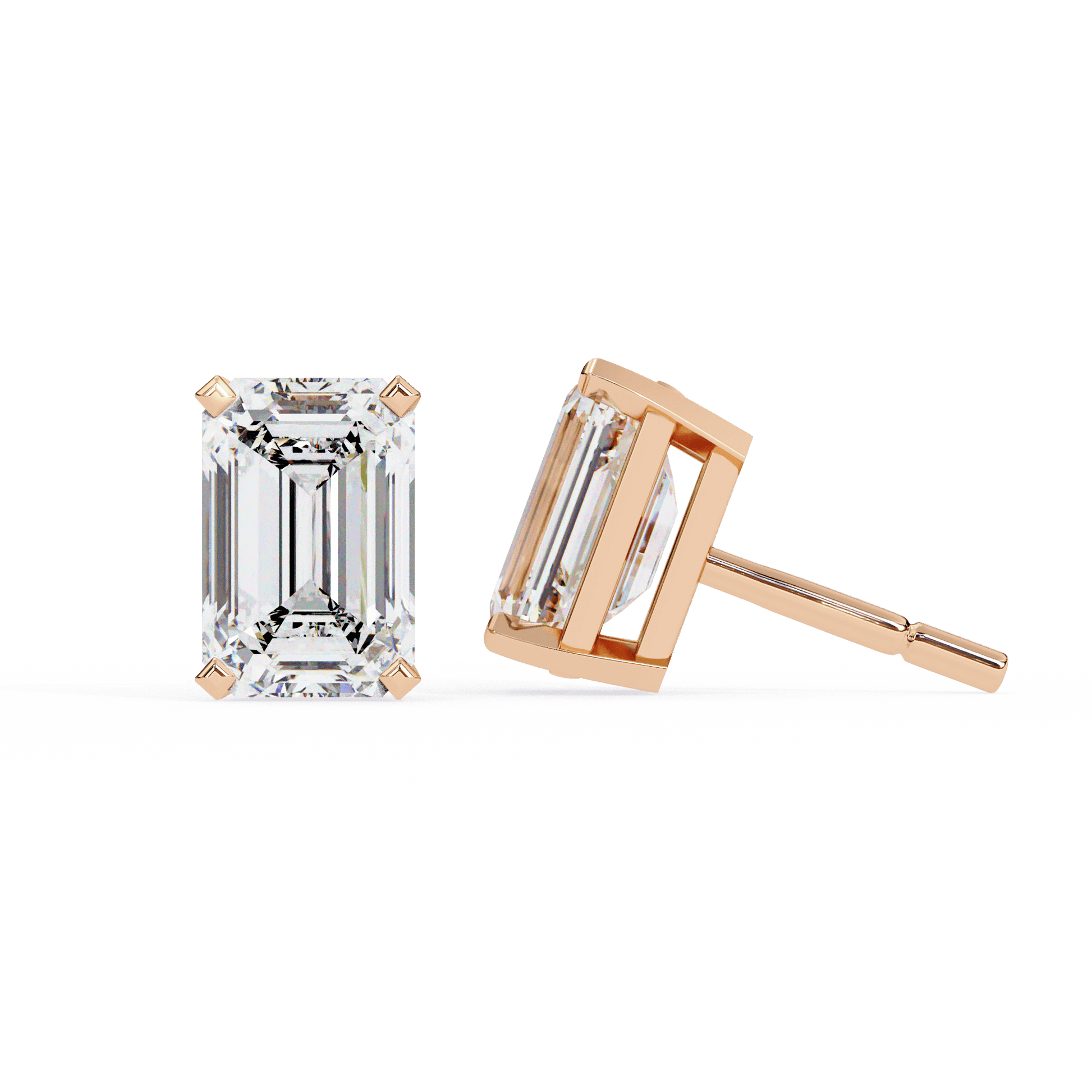 Emerald stud earrings by Carat House Dubai featuring classic, vibrant green emerald gemstones in a timeless design.
