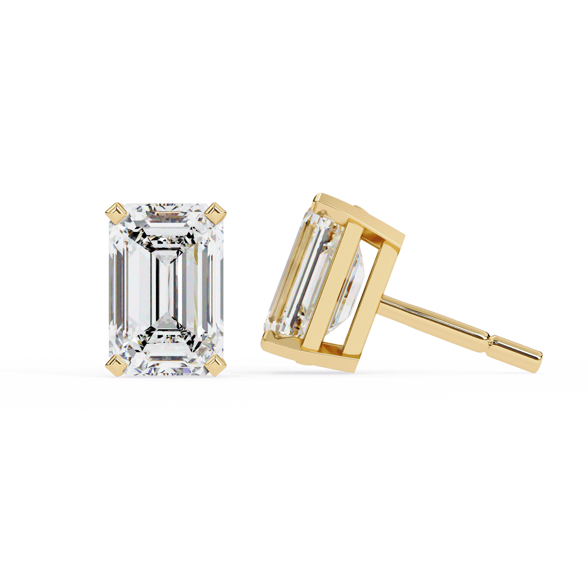 Elegant emerald stud earrings by Carat House Dubai, featuring classic round-cut emerald gemstones in a sleek setting.