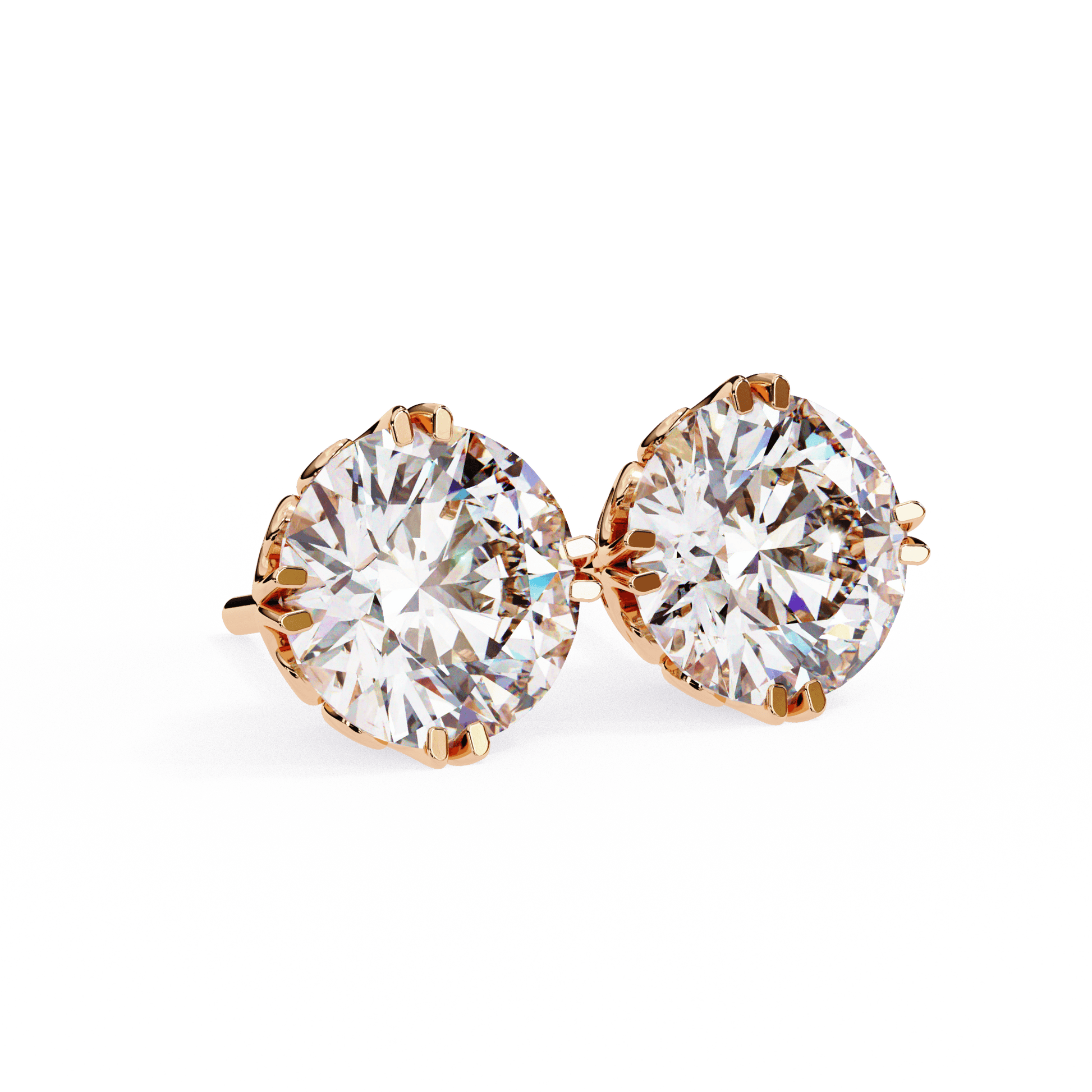 A pair of Alyssa double prong filigree diamond studs from Carat House Dubai, featuring intricate metalwork and sparkling diamonds.