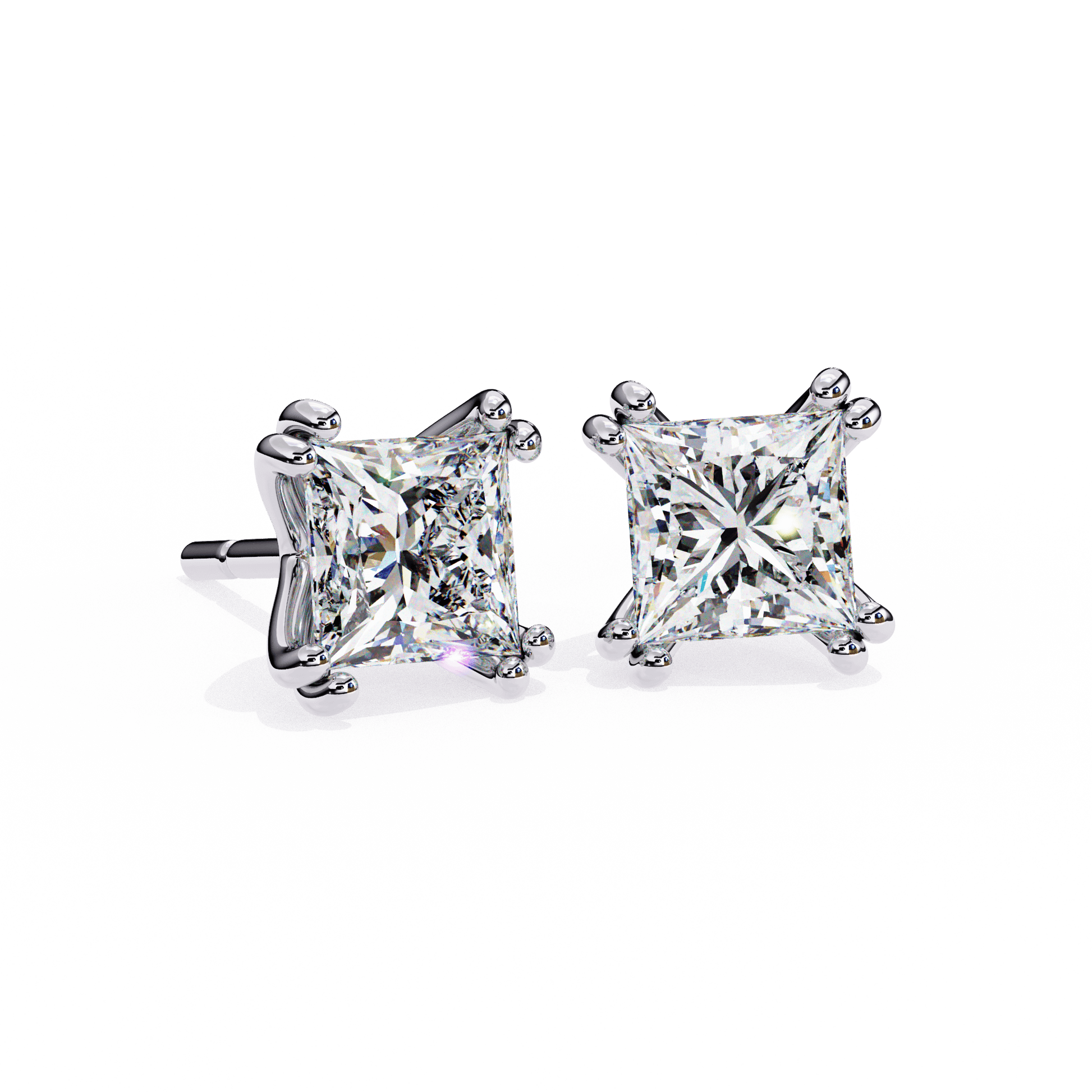 Aimee double prong princess stud earrings by Carat House Dubai, featuring sparkling gemstone accents on a sleek gold setting.