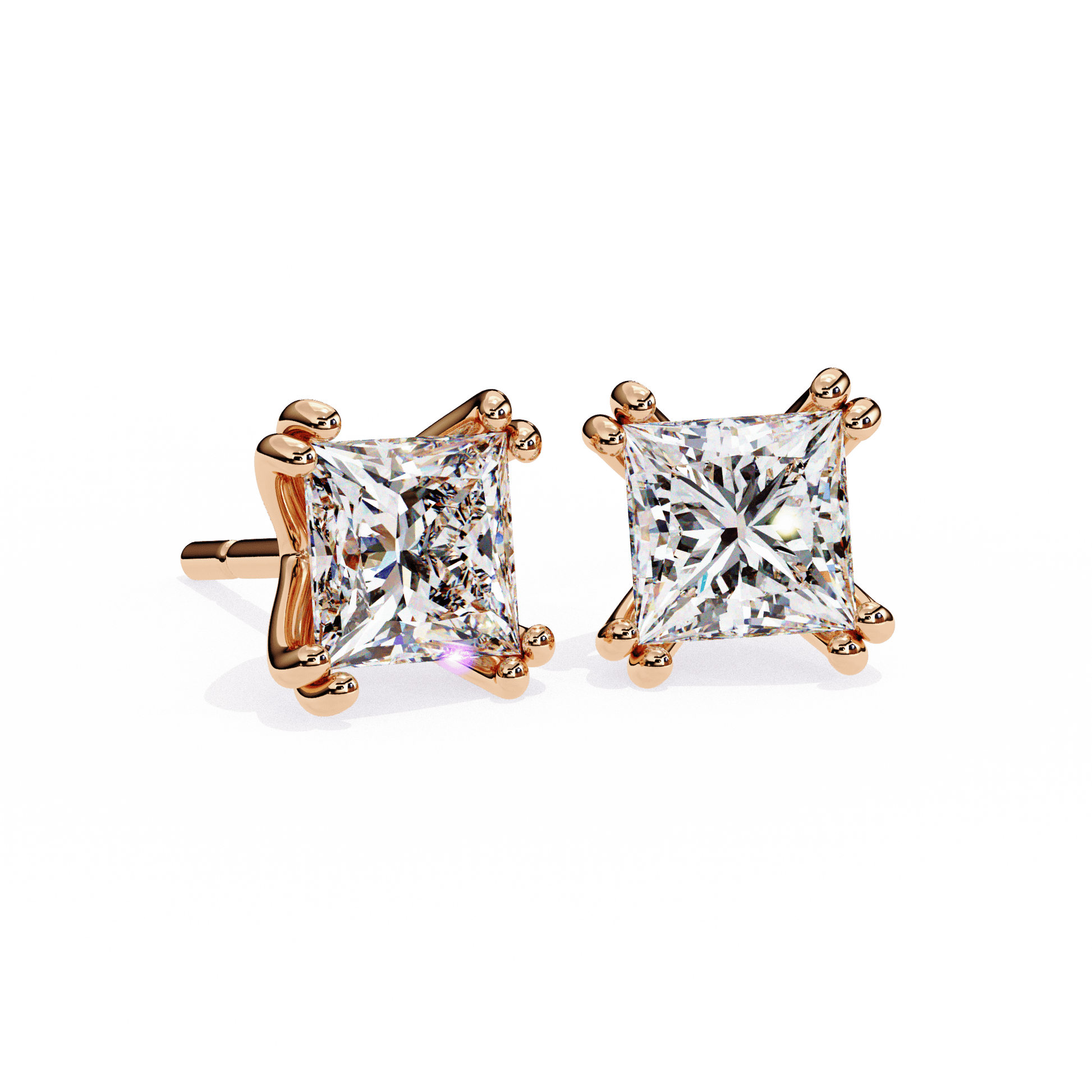 Aimee double prong princess stud earrings by Carat House Dubai featuring sparkling gemstones and silver setting.