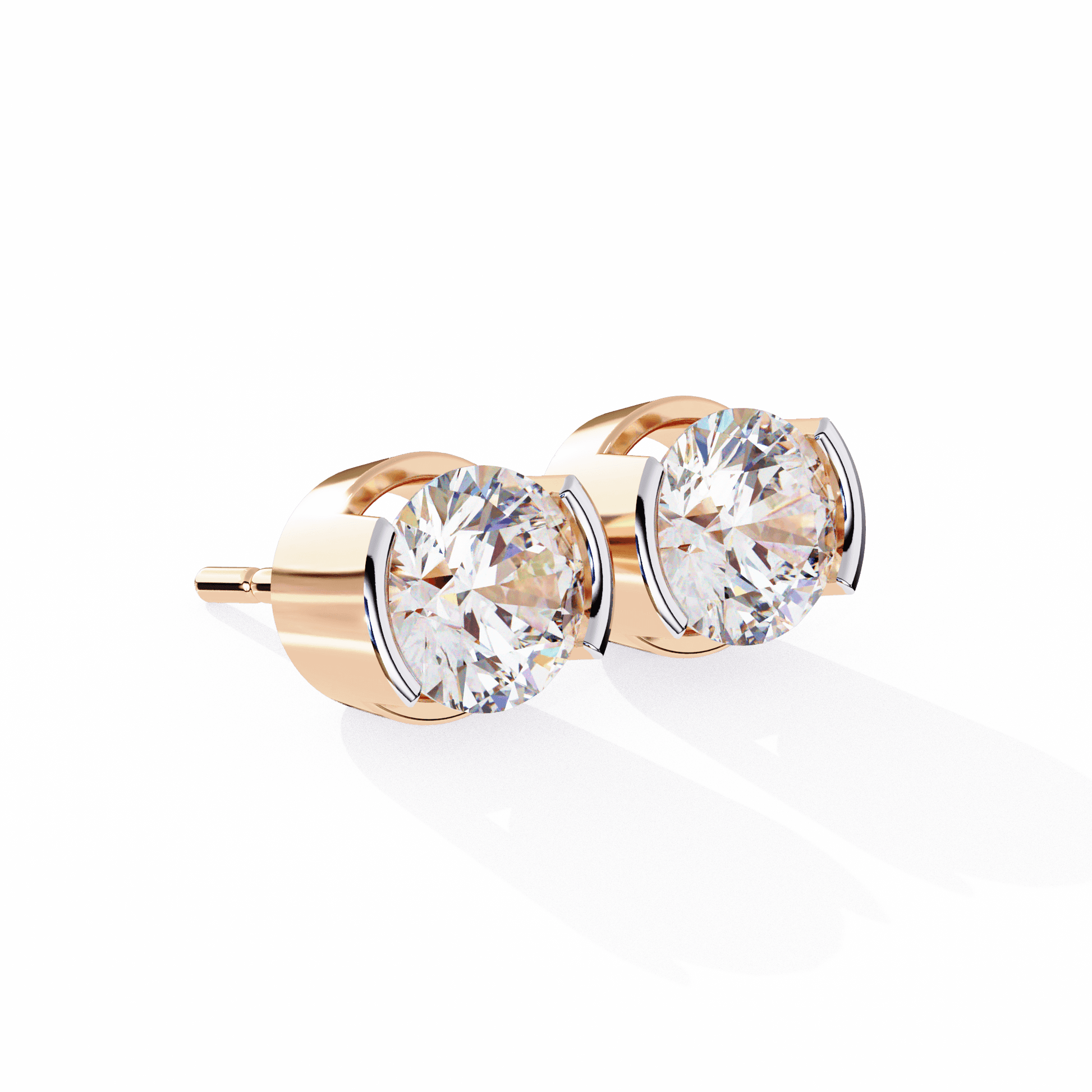 Round diamond stud earrings from Carat House Dubai featuring semi-bezel settings in a classic, elegant design.