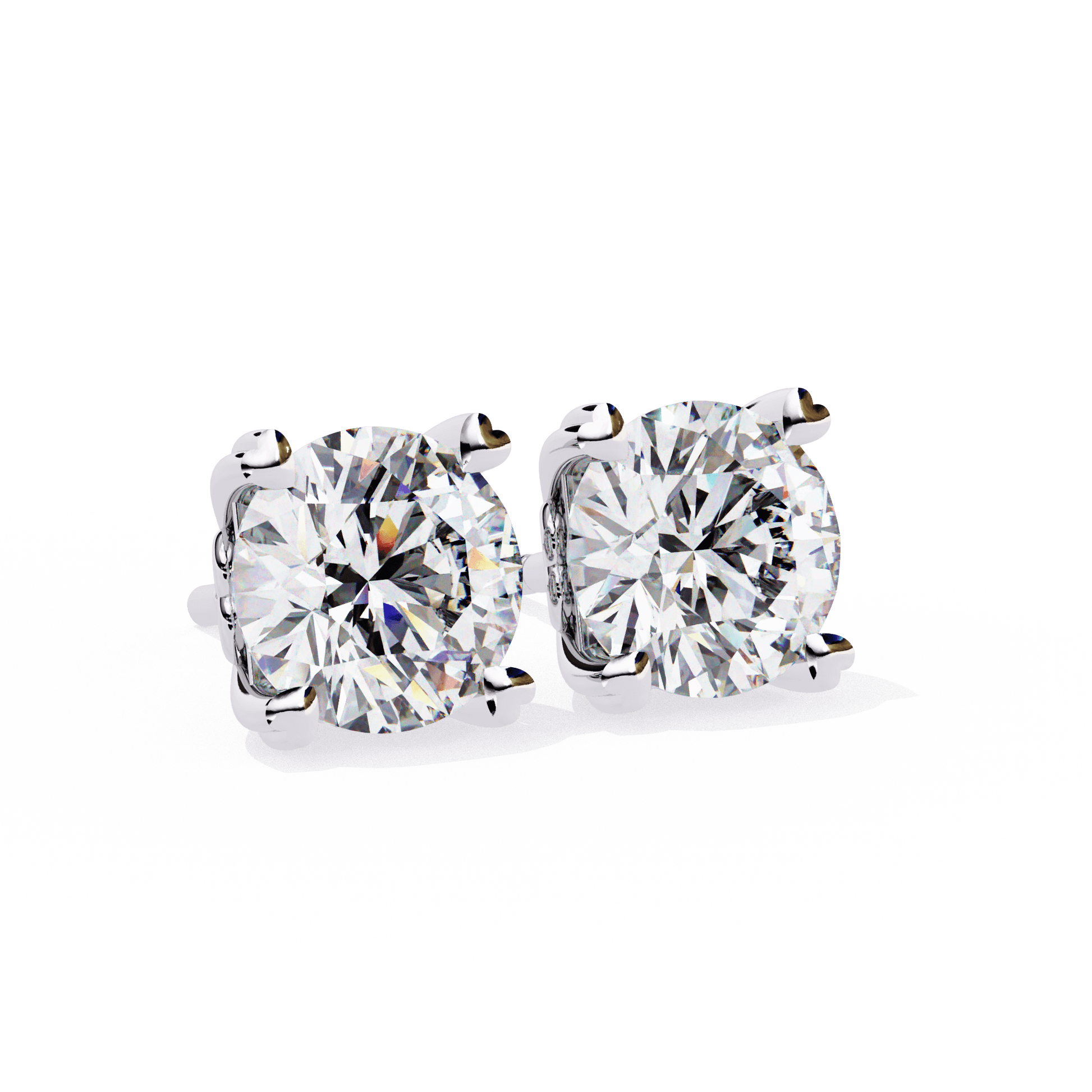 Andrea Heart-Prong Diamond Stud Earrings by Carat House Dubai featuring sparkling diamond studs with heart-shaped prong settings.