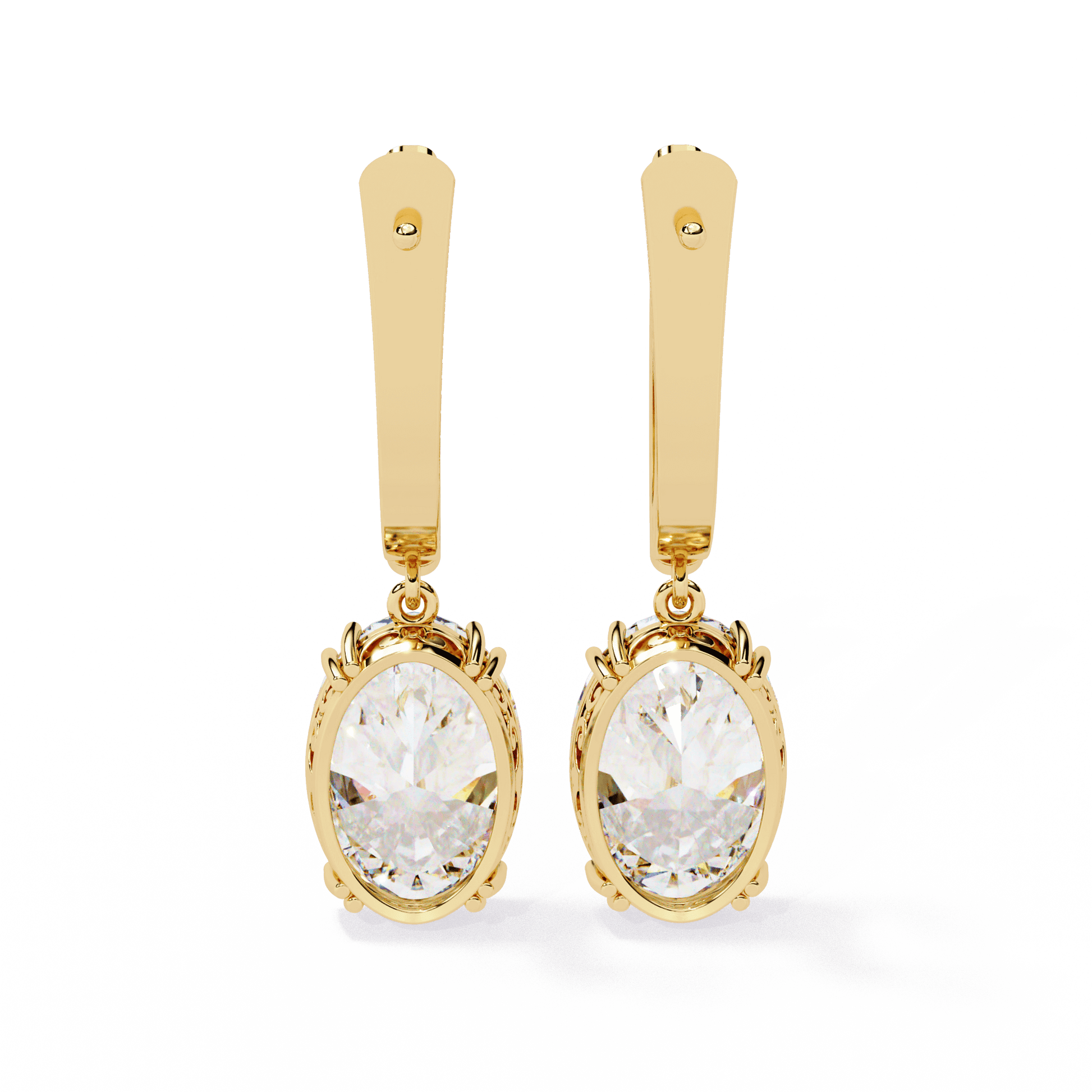 Oval-cut diamond vintage drop earrings by Carat House Dubai featuring elegant oval-shaped diamonds and intricate vintage detailing.