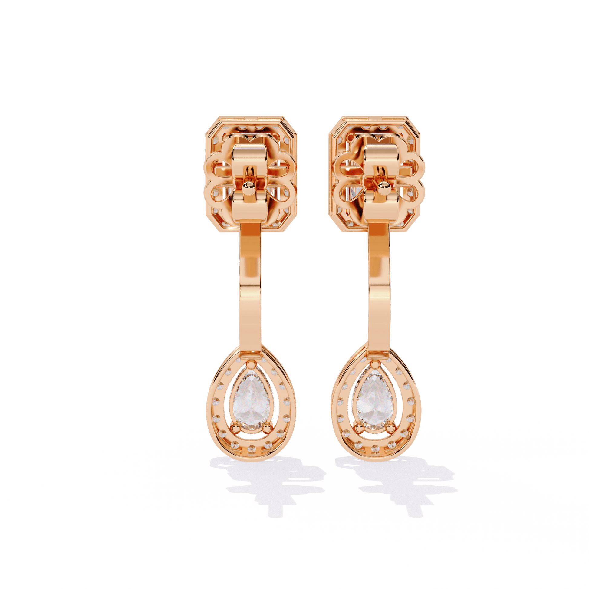 Emerald and pearl halo drop earrings by Carat House Dubai featuring sparkling gemstones and elegant design