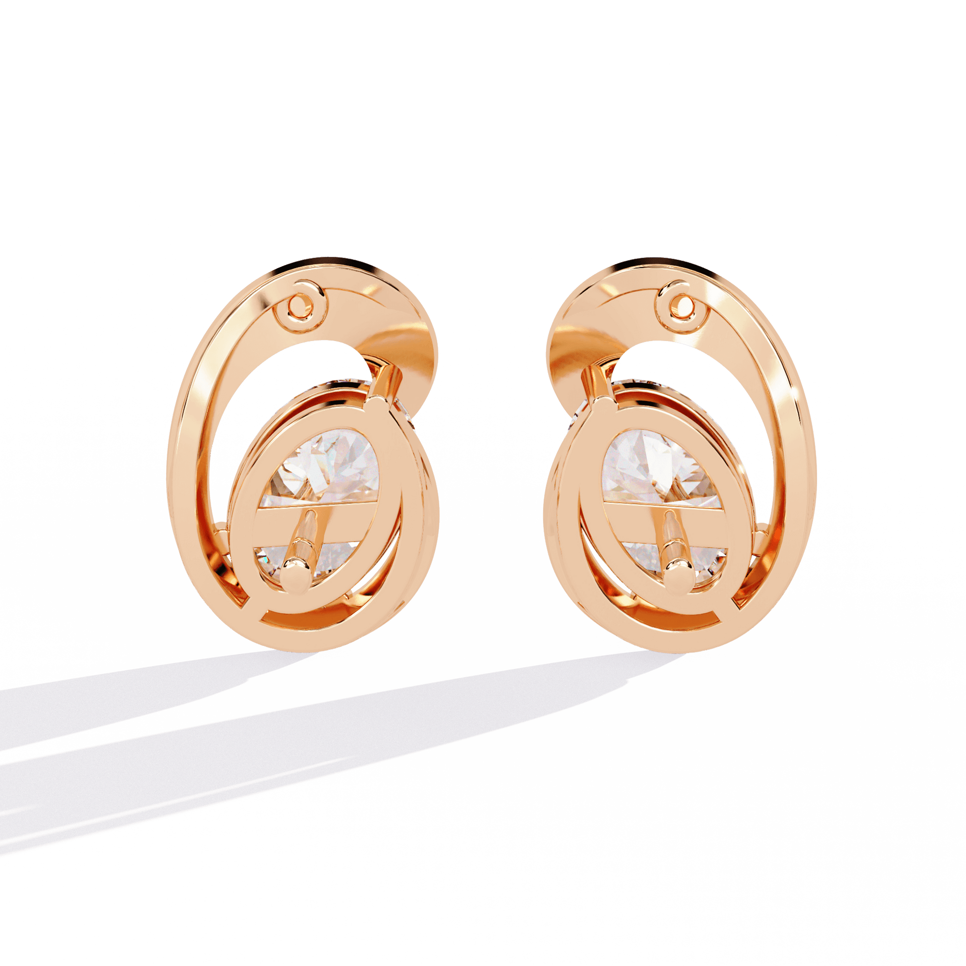 Diane sculpted oval solitaire diamond stud earrings by Carat House Dubai, featuring polished metal and single sparkling diamond.