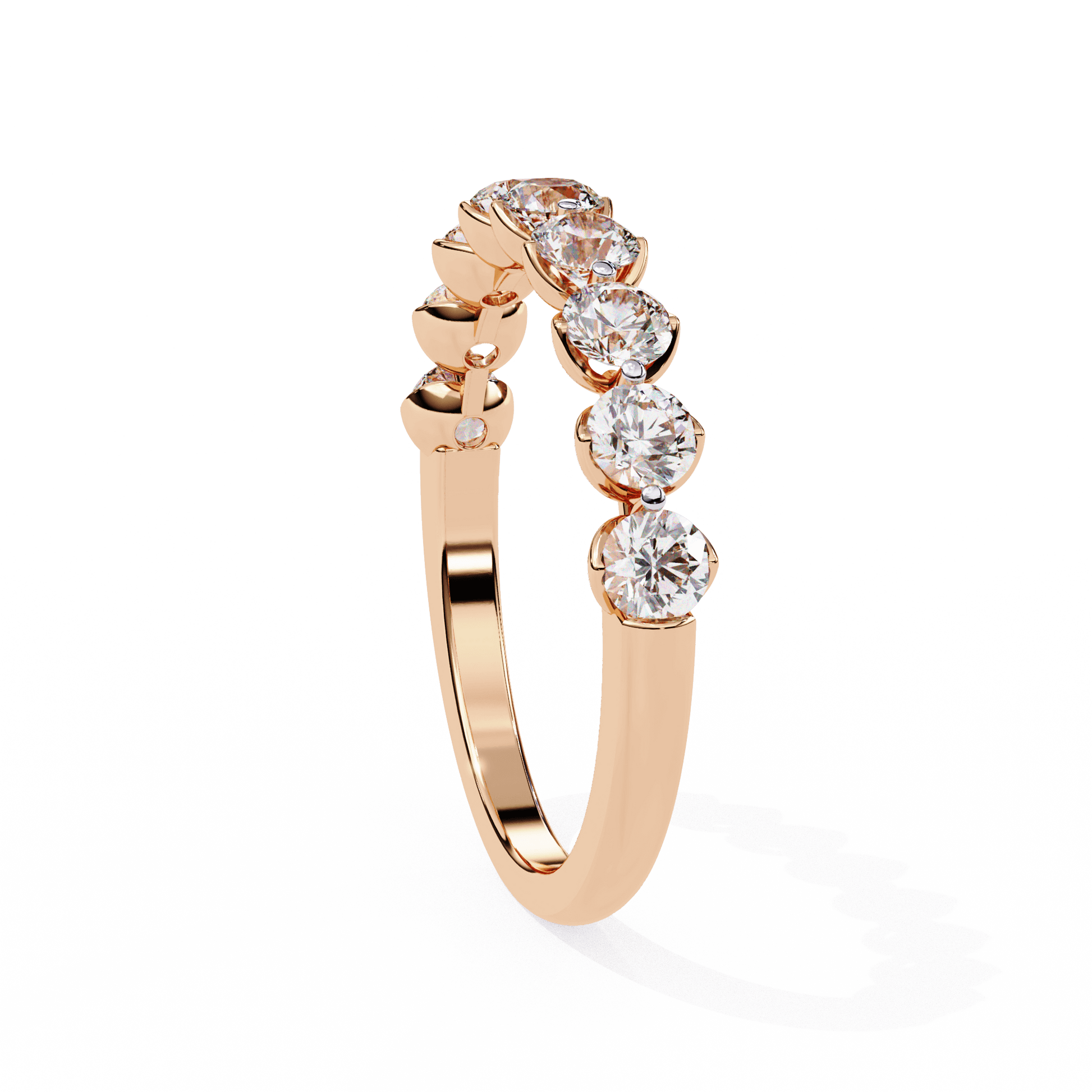 Simone shared prong diamond band with petal accents, elegant gold wedding ring by Carat House Dubai, close-up view of detailed design.