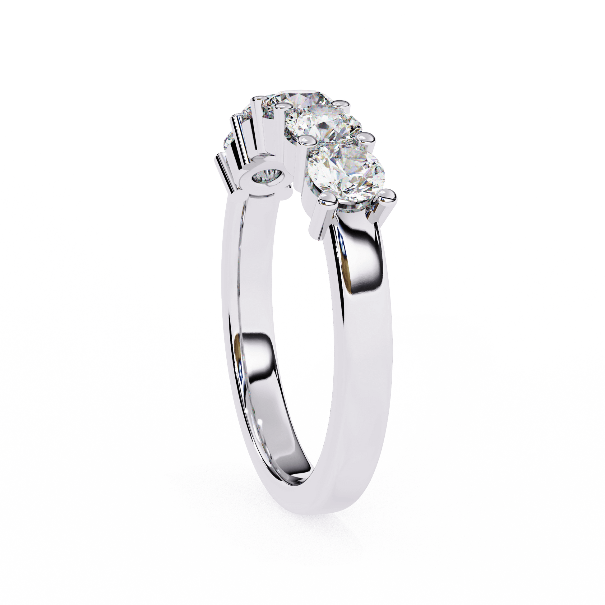Five-stone shared prong wedding band by Carat House Dubai featuring sparkling gemstones on a sleek gold band.