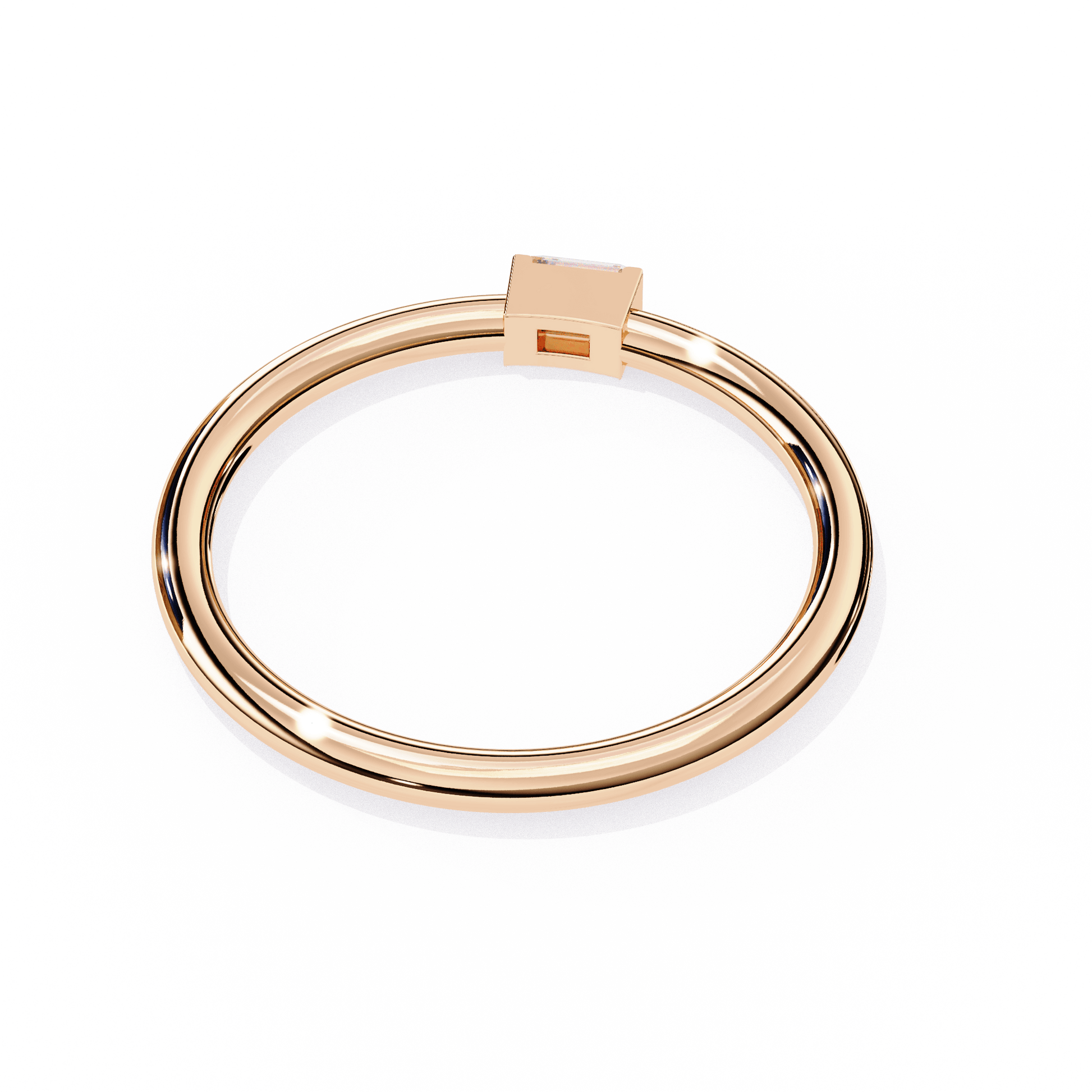Holly Baguette Solitaire Ring by Carat House Dubai featuring a sleek baguette-cut diamond on a delicate band.