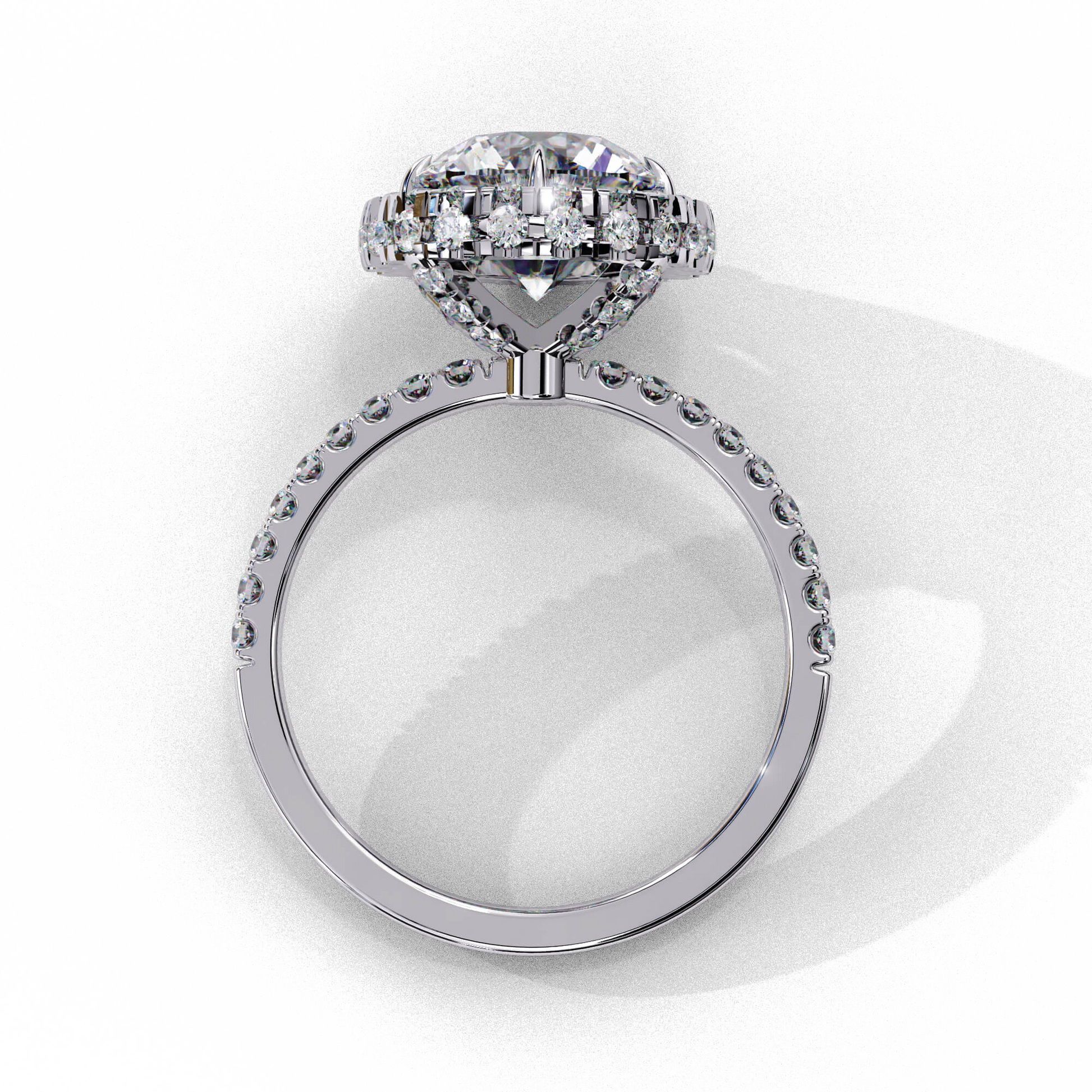 Cassandra — Round cut lab grown and natural diamond engagement ring — single halo, diamond prong setting, pavé band — Carat House