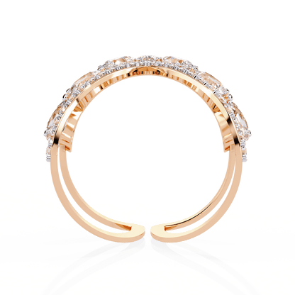 Modern diamond ring featuring open arrow silhouette and pear-shaped stones by Carat House Dubai.