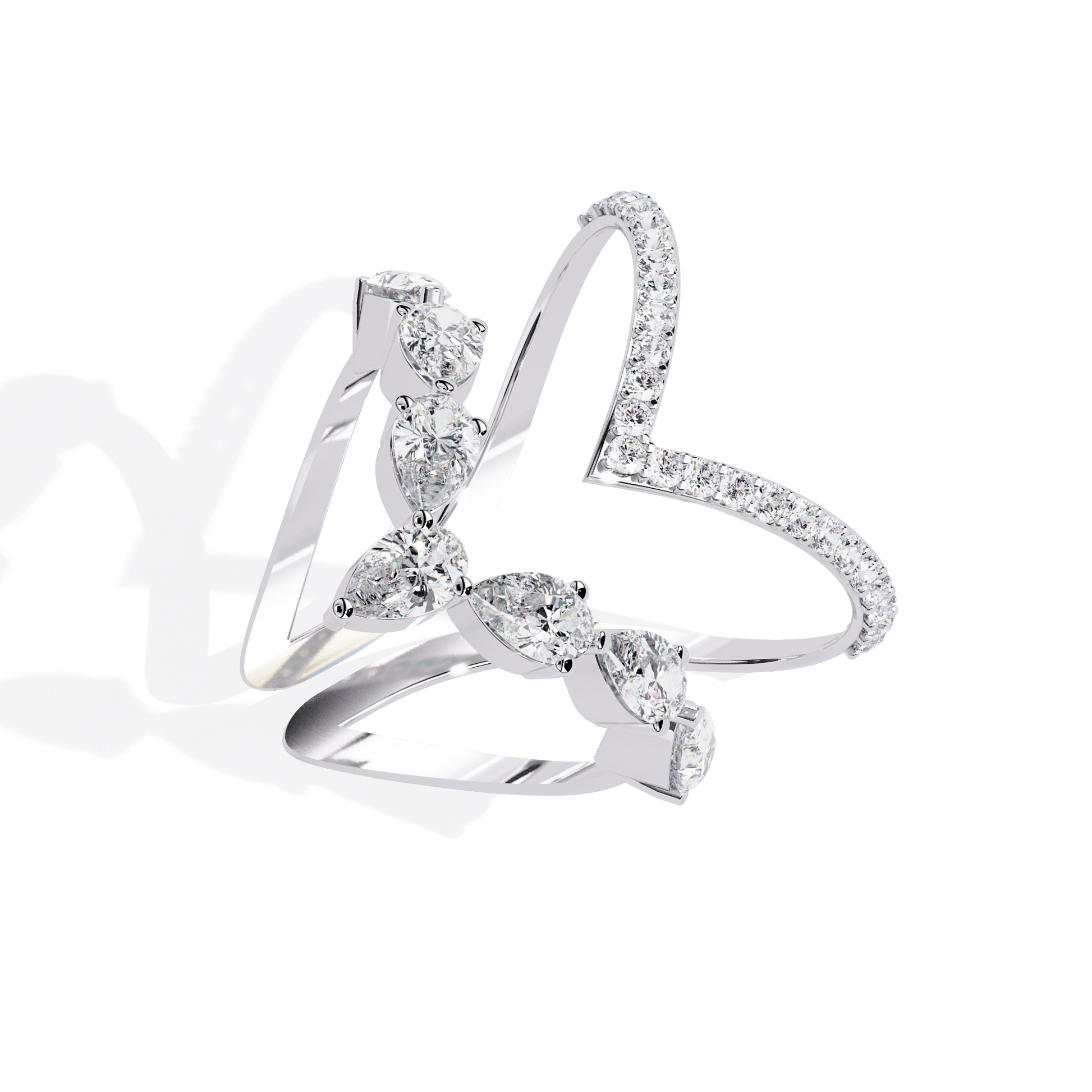 Modern diamond ring by Carat House Dubai featuring an open arrow silhouette and pear-shaped stones.