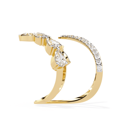 Modern diamond ring by Carat House Dubai featuring an open arrow silhouette and pear-shaped stones.
