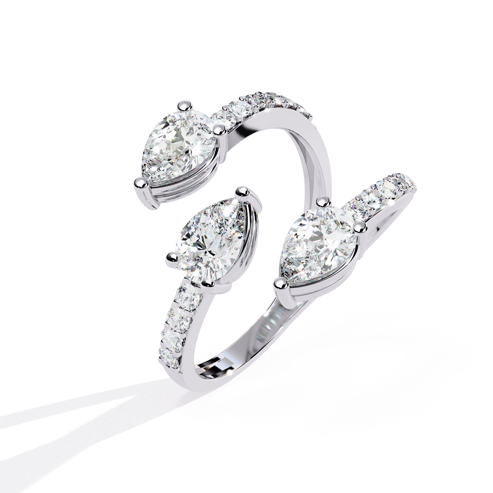 Medusa split band ring by Carat House Dubai featuring pear-cut diamonds and pavé accents on a sleek gold band.