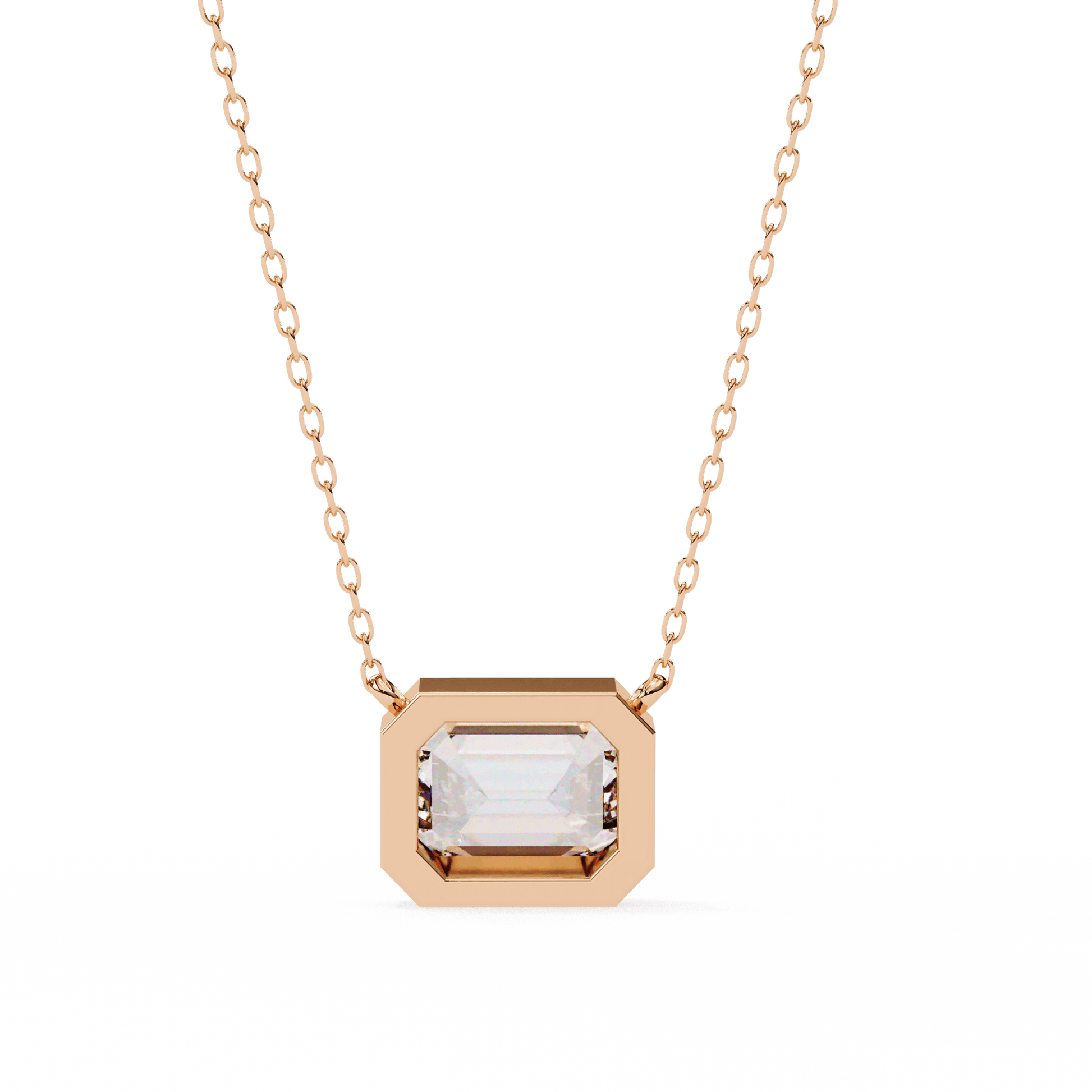 Dana bezel-set emerald-cut diamond solitaire pendant featuring a sparkling diamond on a sleek chain.