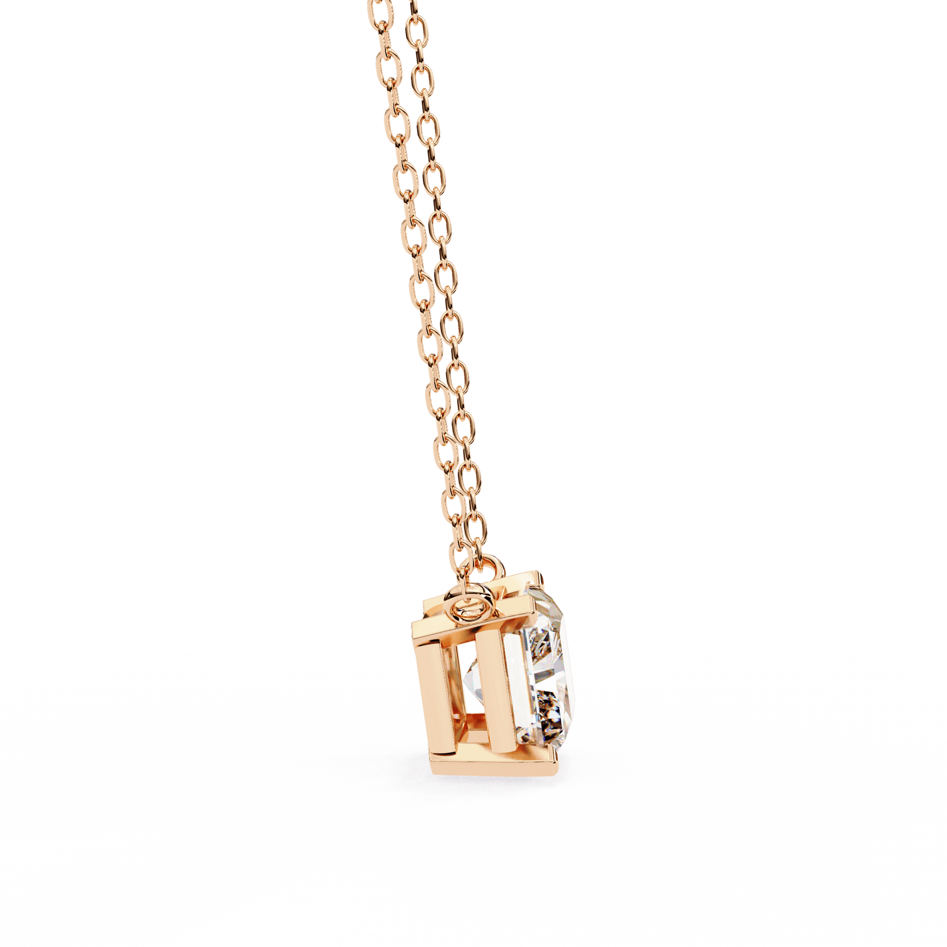 Radiant-cut solitaire pendant by Carat House Dubai featuring a sparkling gemstone on a delicate chain.