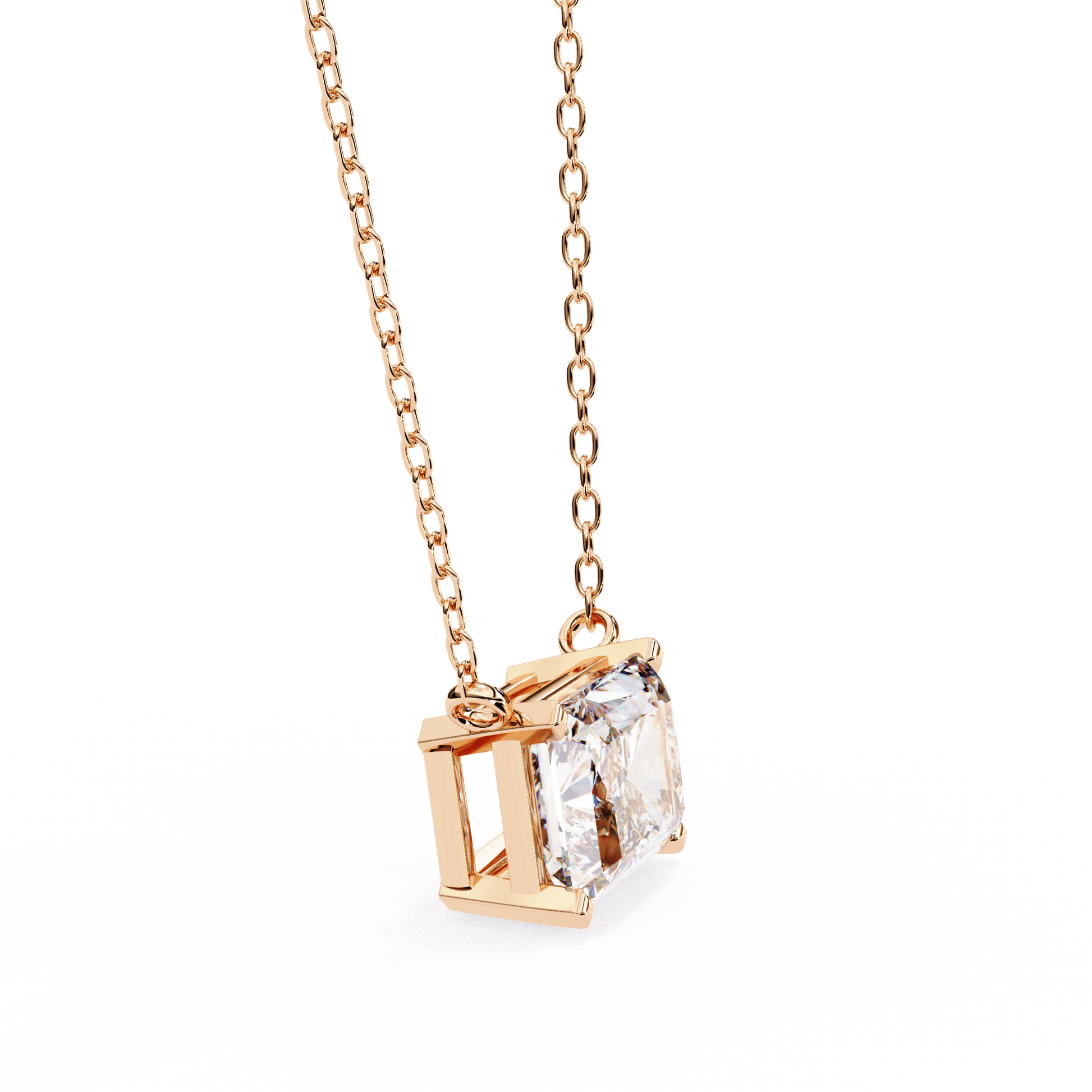 Radiant-cut solitaire pendant from Carat House Dubai featuring a sparkling gemstone on a delicate chain.