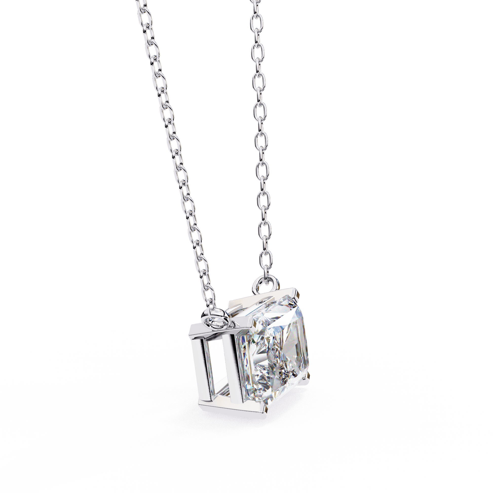Radiant-cut solitaire pendant by Carat House Dubai featuring a sparkling gemstone set in a delicate silver chain.