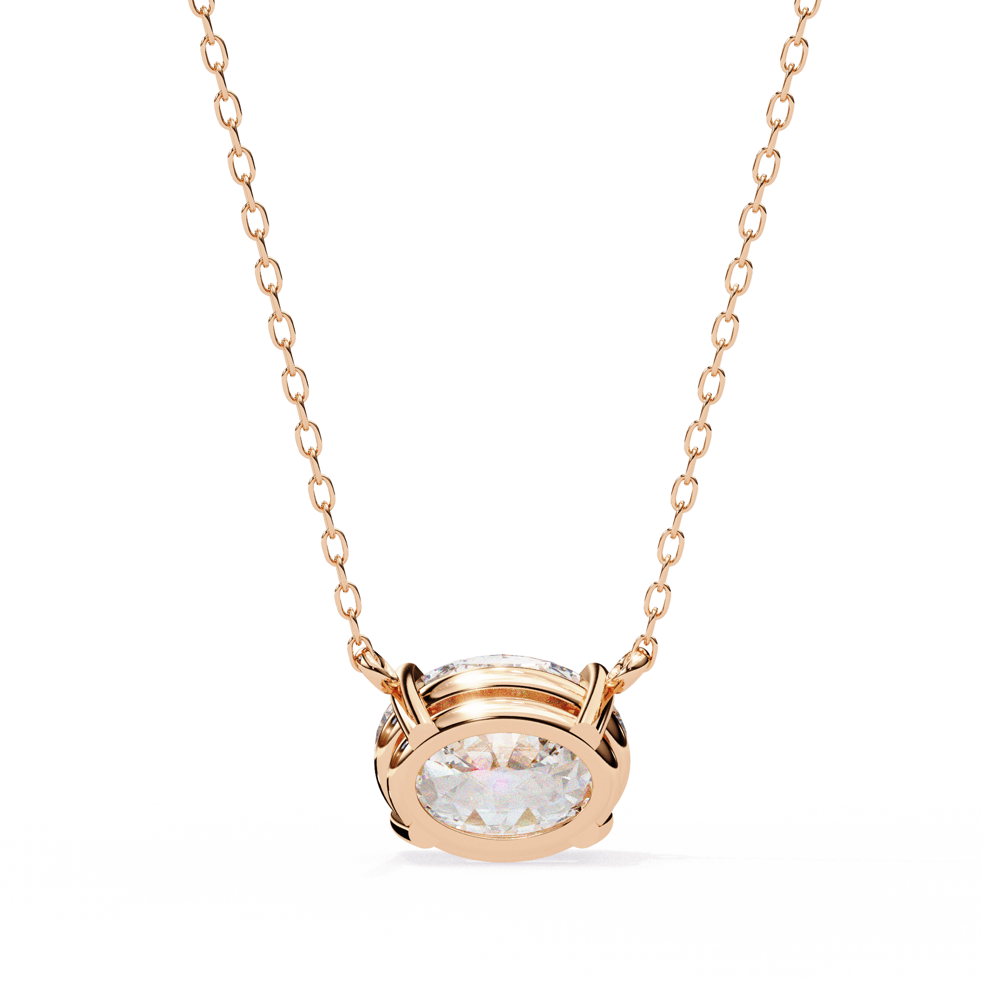 East West oval-cut solitaire pendant by Carat House Dubai featuring a sparkling central gemstone on a delicate chain.