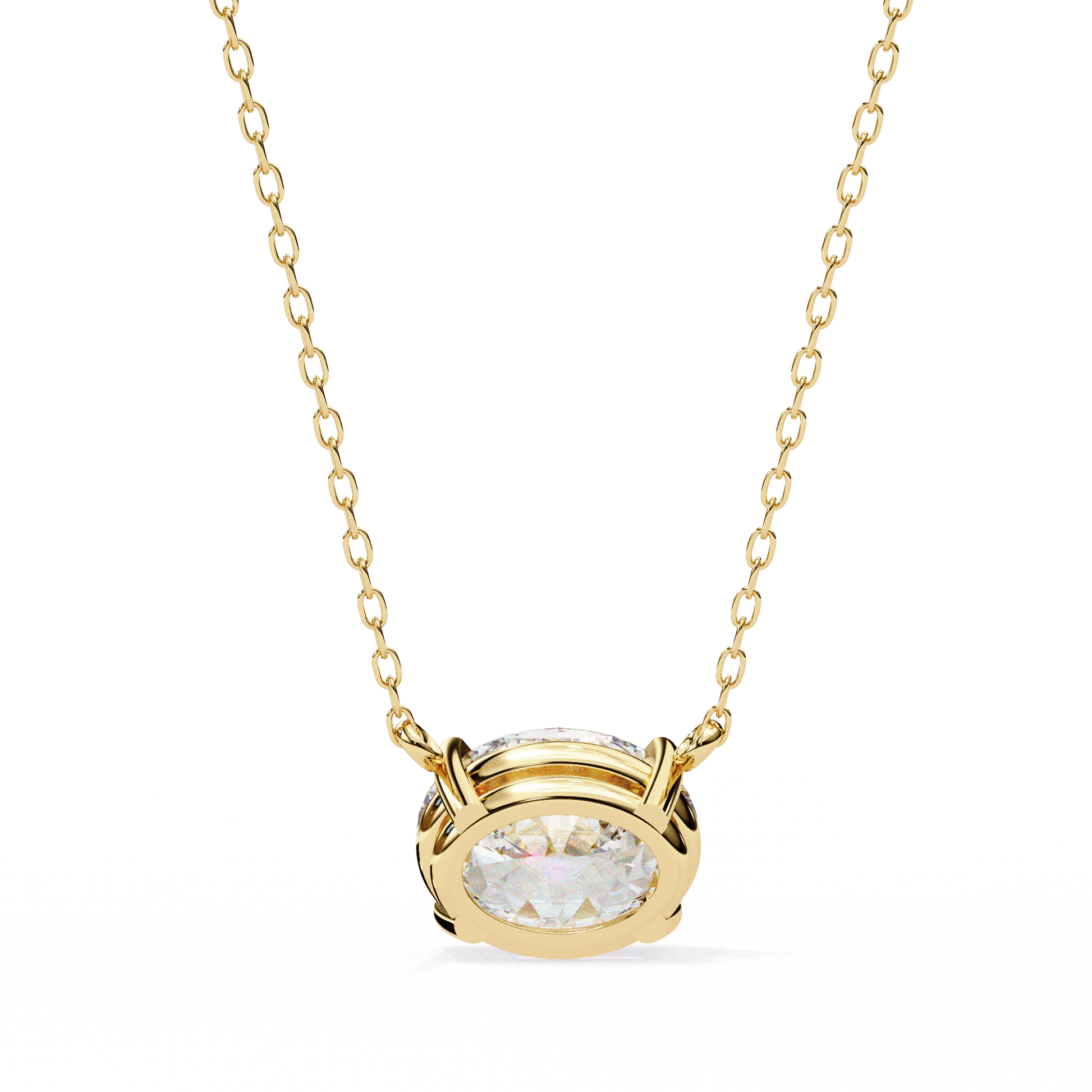 East West oval-cut solitaire pendant by Carat House Dubai featuring a sparkling central gemstone on a delicate chain.