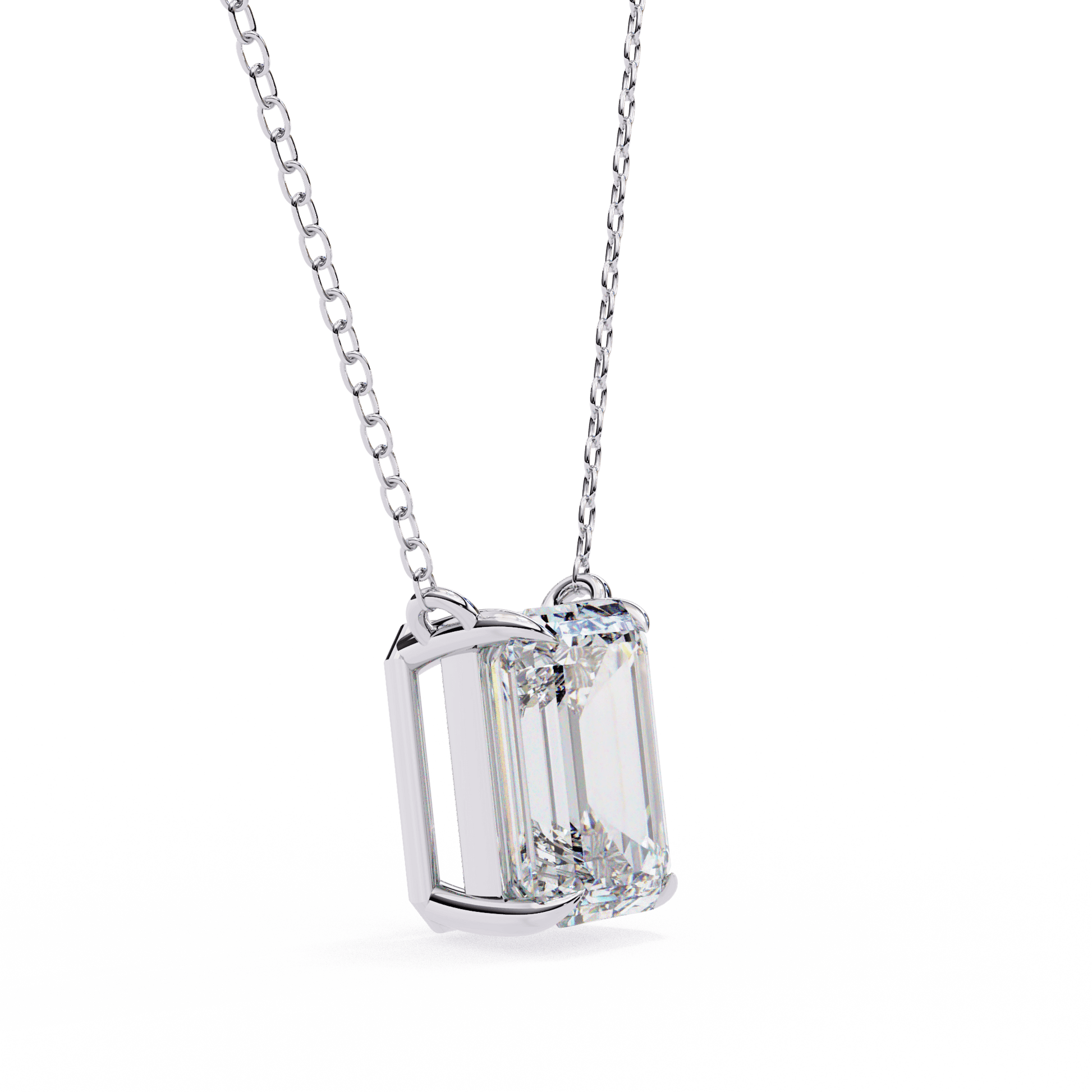 Emerald-cut solitaire pendant by Carat House Dubai featuring a sparkling gemstone on a delicate chain.