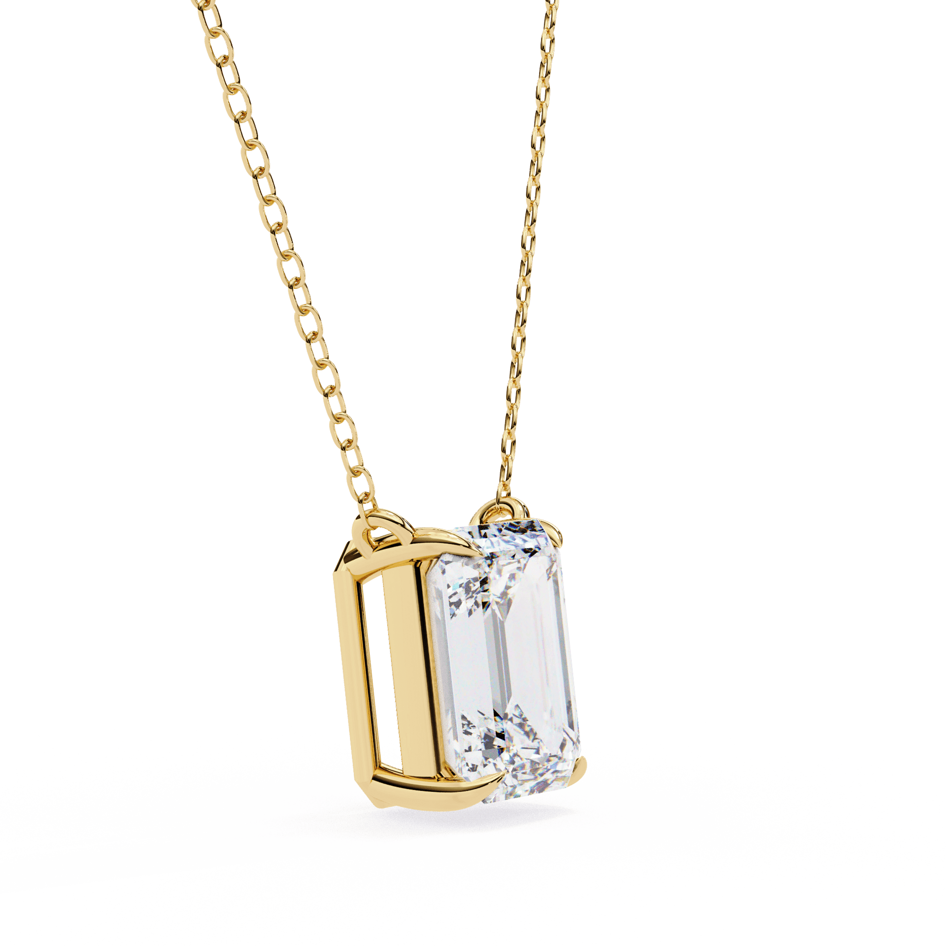 Emerald-cut solitaire pendant by Carat House Dubai featuring a sparkling gemstone on a delicate chain.
