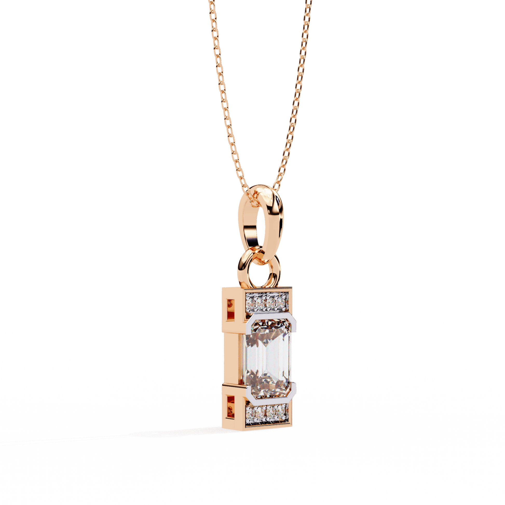 Emerald solitaire pendant with accent diamonds by Carat House Dubai, featuring a central green emerald gemstone and sparkling diamond accents.