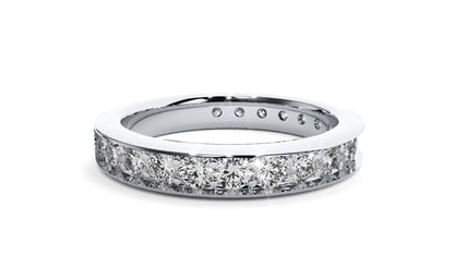 Luciana – The Channel-Set Shared Prong Eternity Band