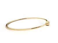 Roxana – Oval Gold Bangle with Bezel-Set Round Diamond